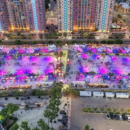 Aerial view of an outdoor festival lit up at night
